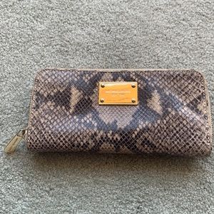 Snakeskin michael Kors zip around wallet